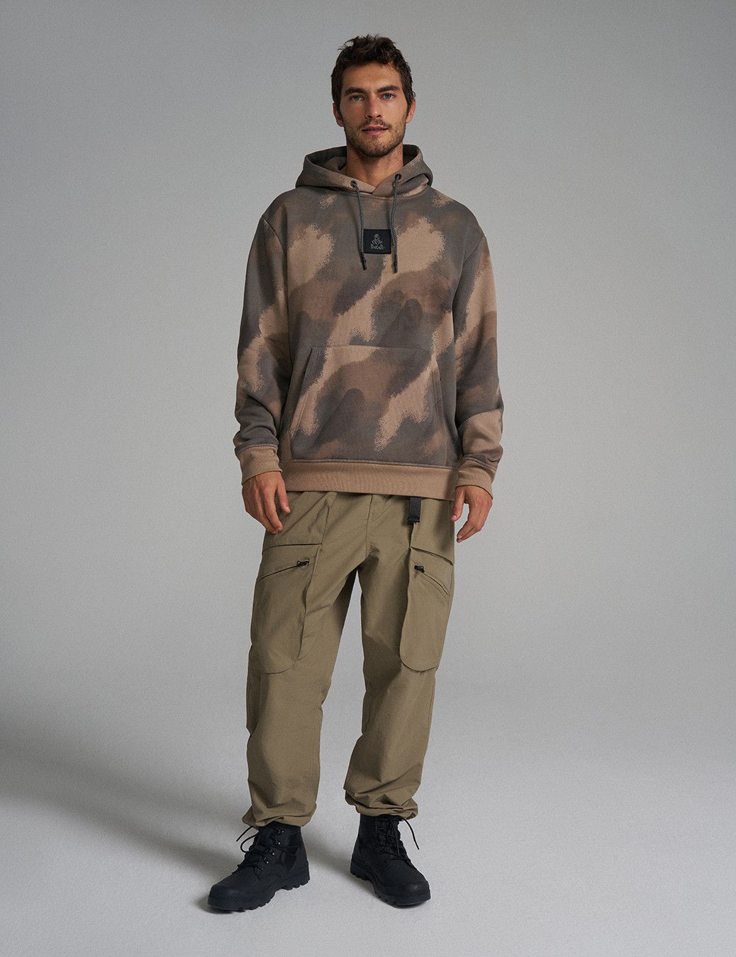 国内未入荷 DARKFOG - KANGAROO POCKETS HOODED CAMOUFLAGE Kangaroo hoodie with a printed pattern from DEXT DAKAR - Dakar